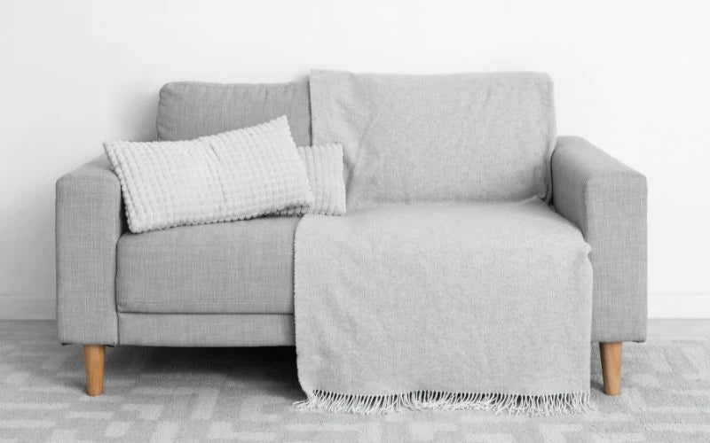 ¿Cómo Poner Una Manta En Un Sofá? | Fundas Moderna